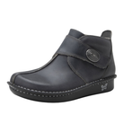 Side View of Women’s Alegria Caiti boot in oiled ash – featuring a cushioned cork and memory foam footbed, side zipper with adjustable buckle strap, and slip-resistant outsole for versatile wear.