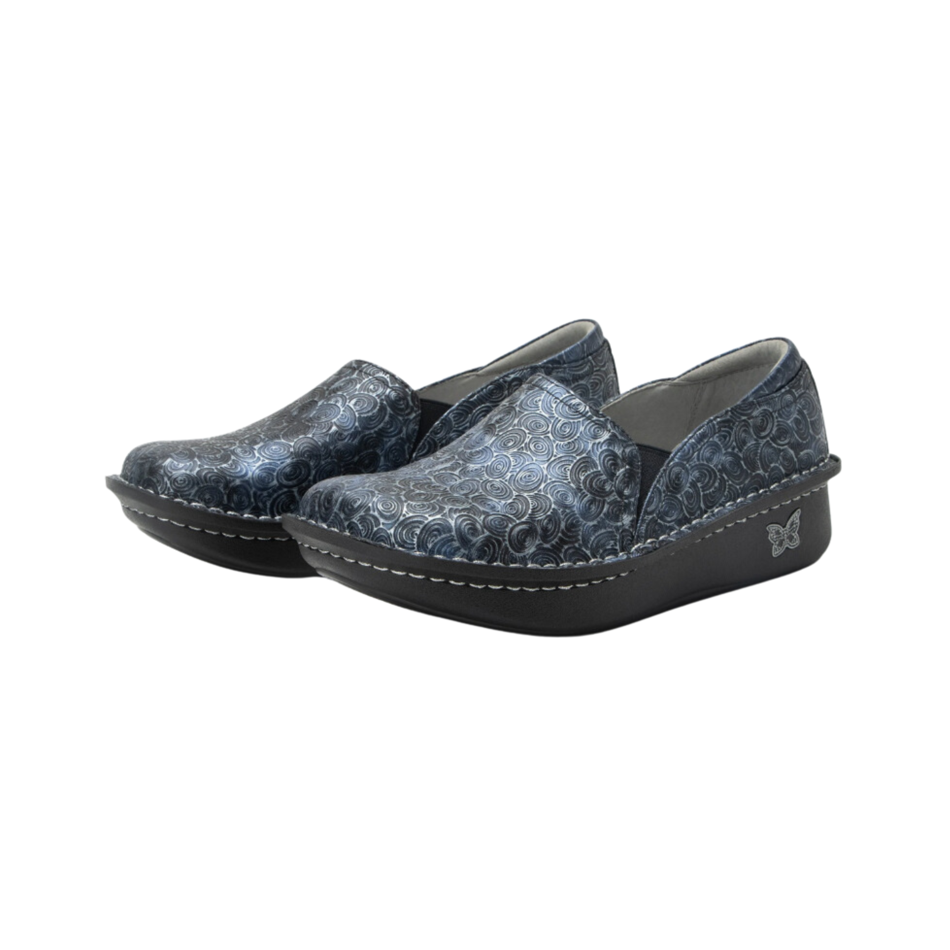 Angled view of Women’s Alegria Debra casual slip-on in blue and black – featuring printed upper with artistic details, cushioned footbed, breathable lining, and flexible sole.