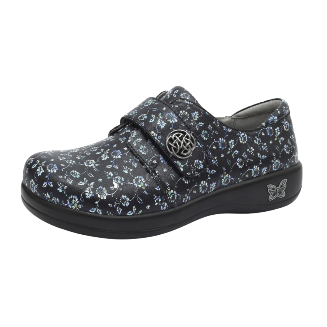 Side View of Women’s Alegria Joleen shoe in Work Pretty print – featuring a cushioned removable footbed, adjustable hook-and-loop strap, and slip-resistant outsole for stability.