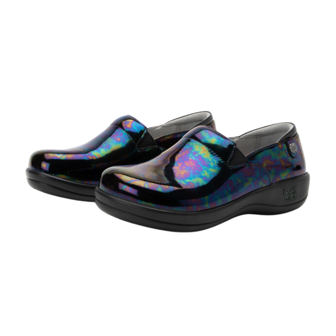 Angled view of Women’s Alegria Keli casual slip-on in black with multi-colors – featuring patent leather accents, cushioned footbed, elastic gore for easy wear, and slip-resistant sole.