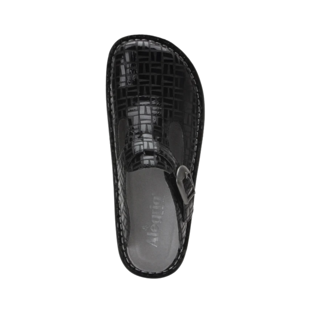Top View of Women’s Alegria Classic clog in Score – featuring a wide, roomy toe box for natural toe movement, a removable cushioned footbed designed for arch and heel support, and a glossy black geometric-patterned leather upper that is easy to clean and ideal for everyday or professional wear.