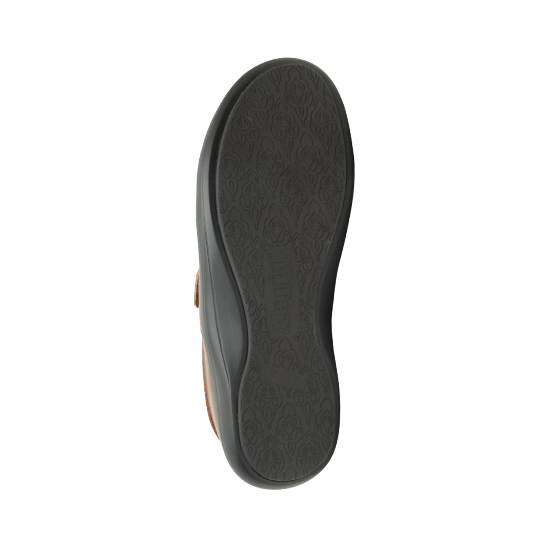 Bottom View of Women’s Alegria Danni loafer in saddle brown – featuring a slip-resistant patterned outsole, durable tread design, and lightweight construction for secure footing.
