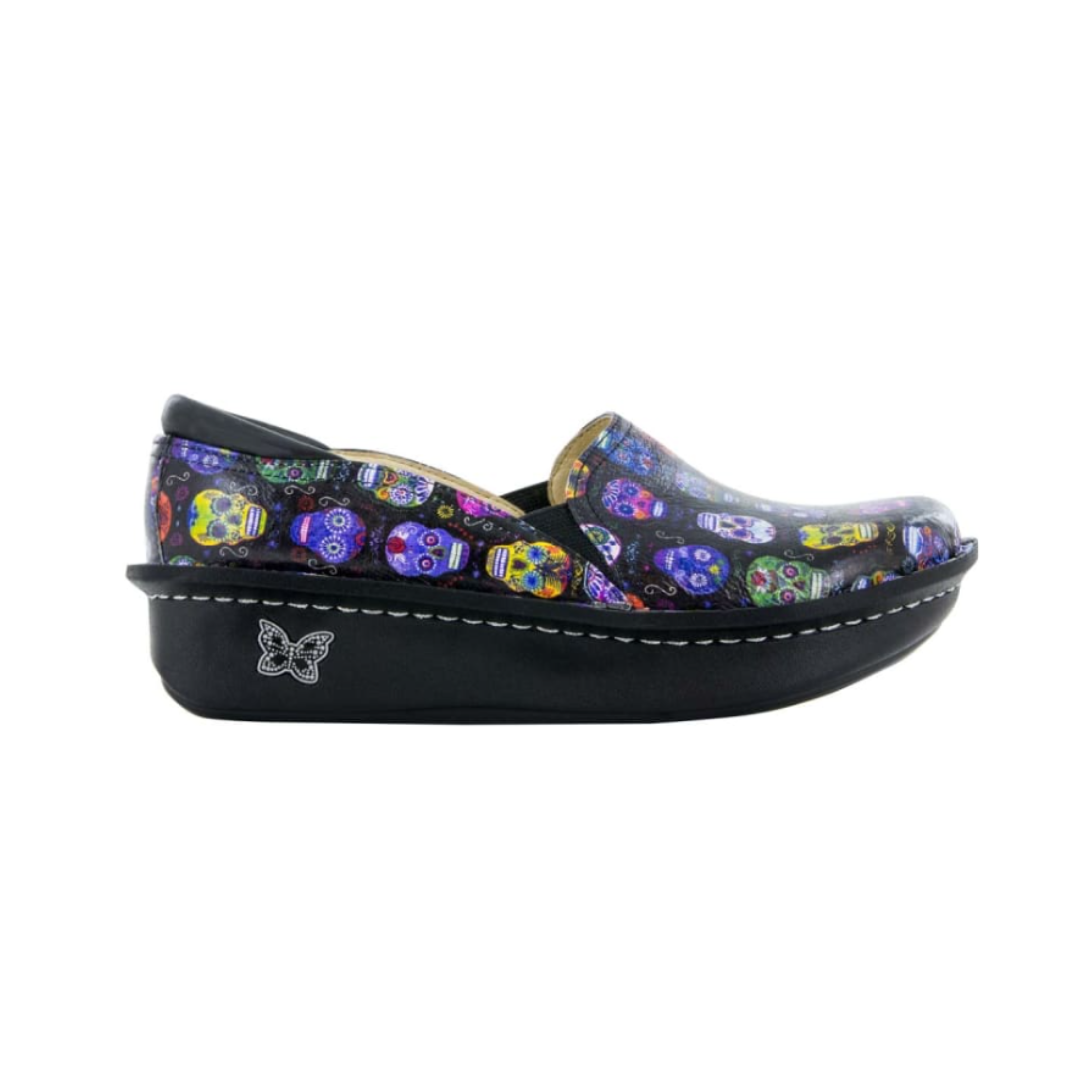 Side View of Women’s Alegria Debra professional shoe in Sugar Skulls – featuring a rocker outsole that promotes proper walking motion and reduces strain on joints, double elastic gores for a flexible yet secure fit, and supportive arch technology for long-lasting stability.
