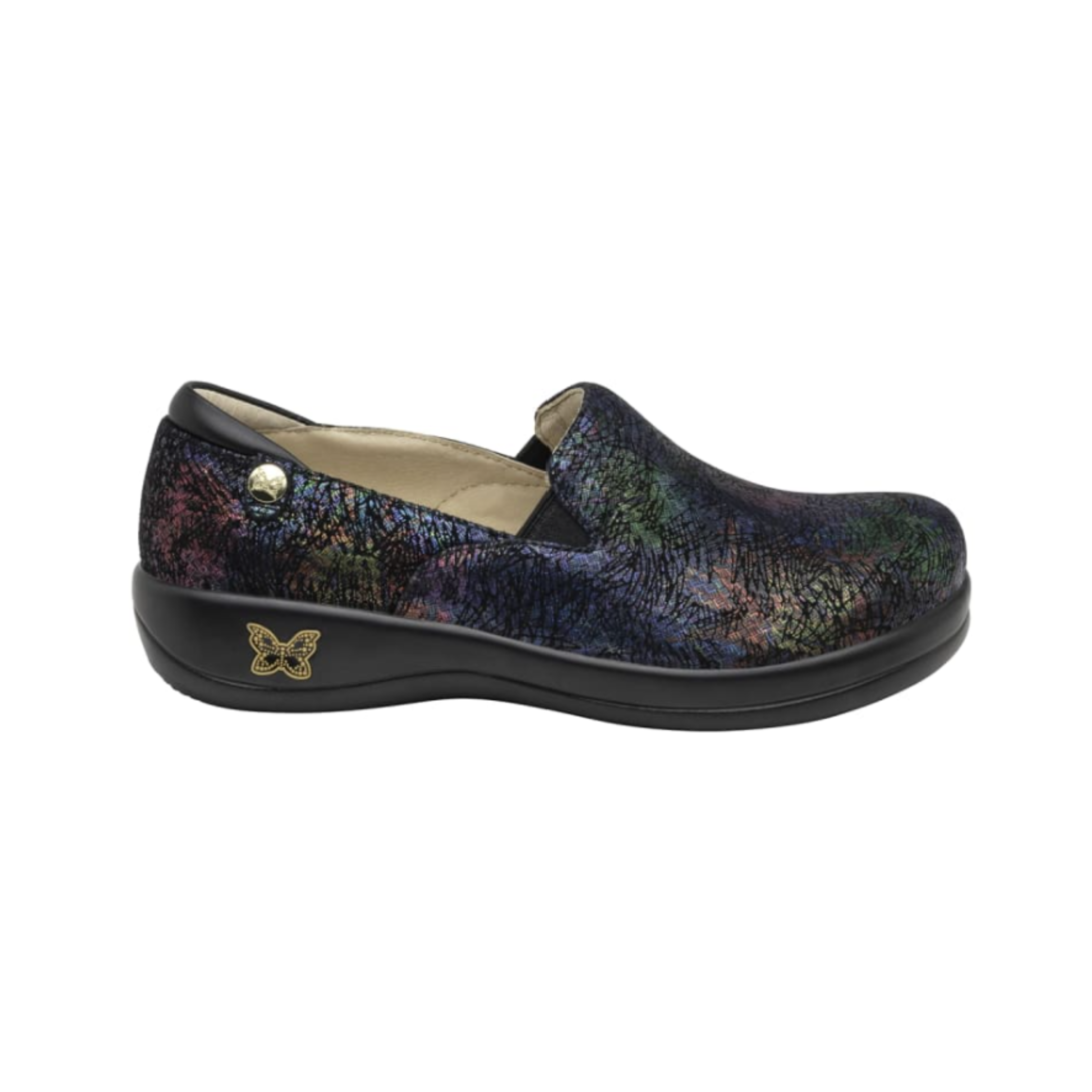 Side View of Women’s Alegria Keli Dynomite slip-on shoe in multicolor print – featuring flexible twin elastic gores for easy wear, slip-resistant outsole for secure footing, and supportive rocker bottom to promote natural movement.