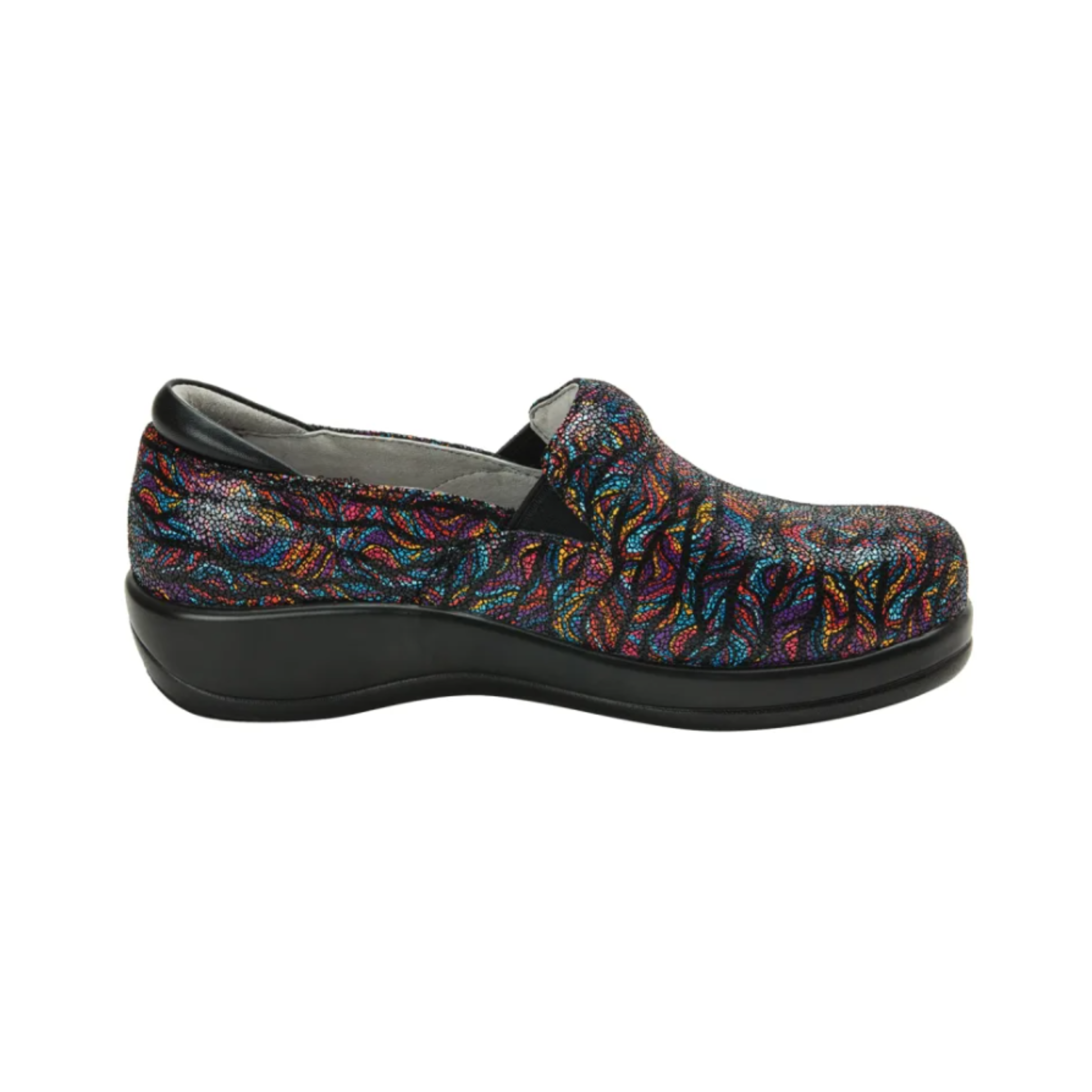 Side View of Women’s Alegria Keli Dynomite slip-on shoe in multicolor print – featuring flexible twin elastic gores for easy wear, slip-resistant outsole for secure footing, and supportive rocker bottom to promote natural movement.
