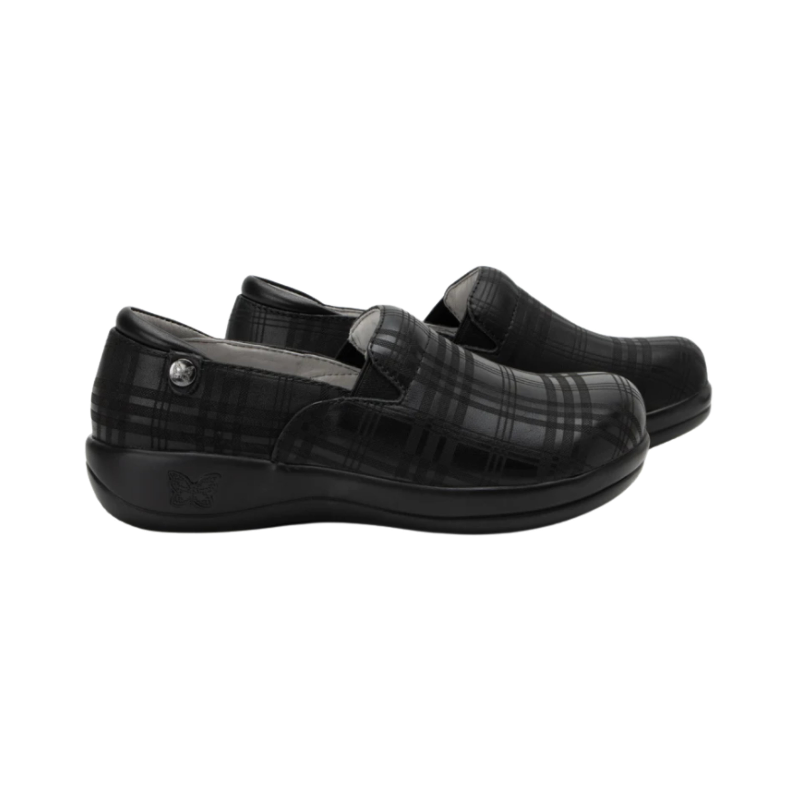 Side View of Women’s Alegria Keli Plaid To Meet You slip-on shoe in multicolor plaid pattern – featuring double elastic side gores for flexible fit, slip-resistant outsole for enhanced traction, and lightweight rocker bottom for natural stride.