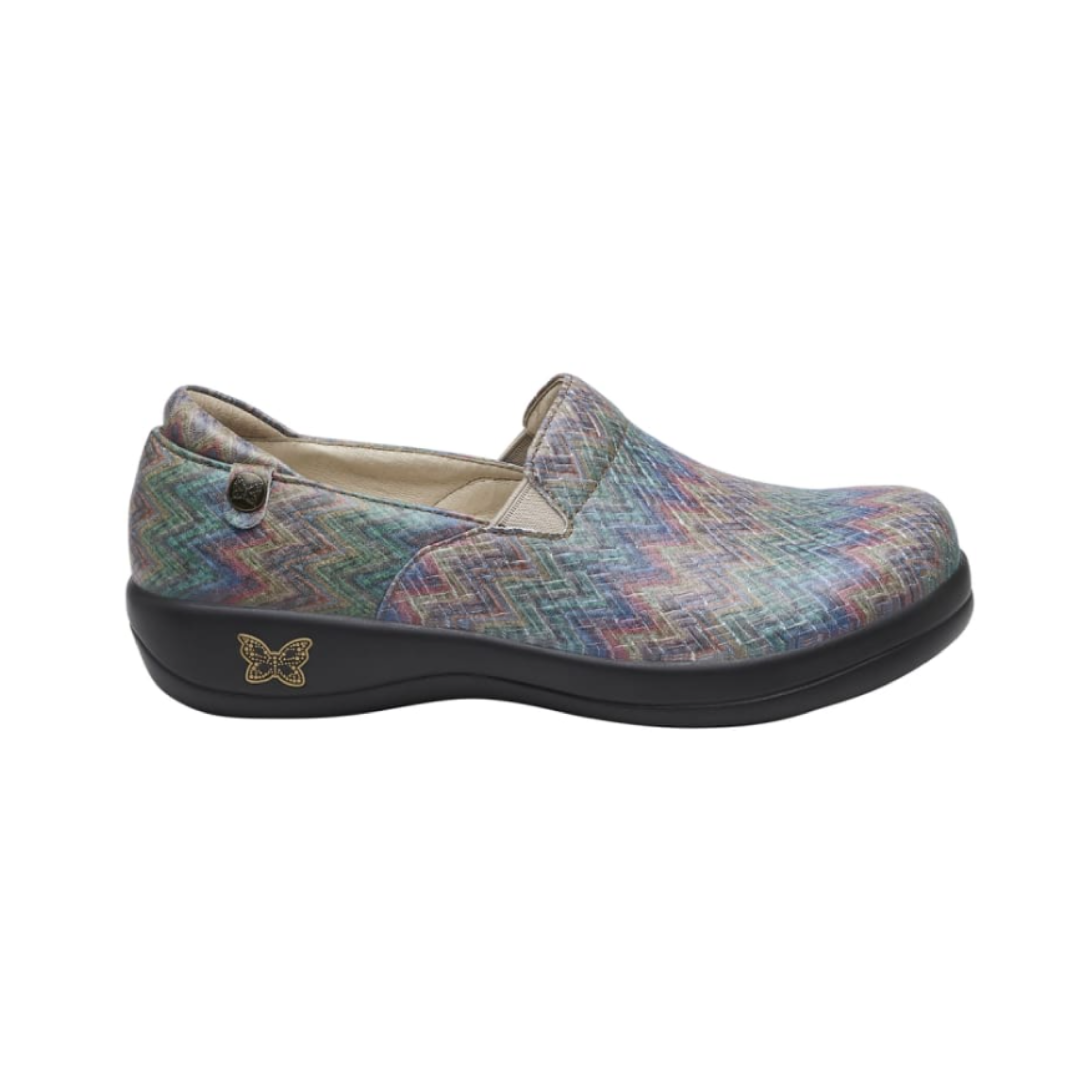 Side View of Women’s Alegria Keli Woven Wonder slip-on shoe in multicolor woven pattern – featuring double elastic gores for flexible fit, slip-resistant outsole for superior grip, and lightweight rocker bottom for natural motion.