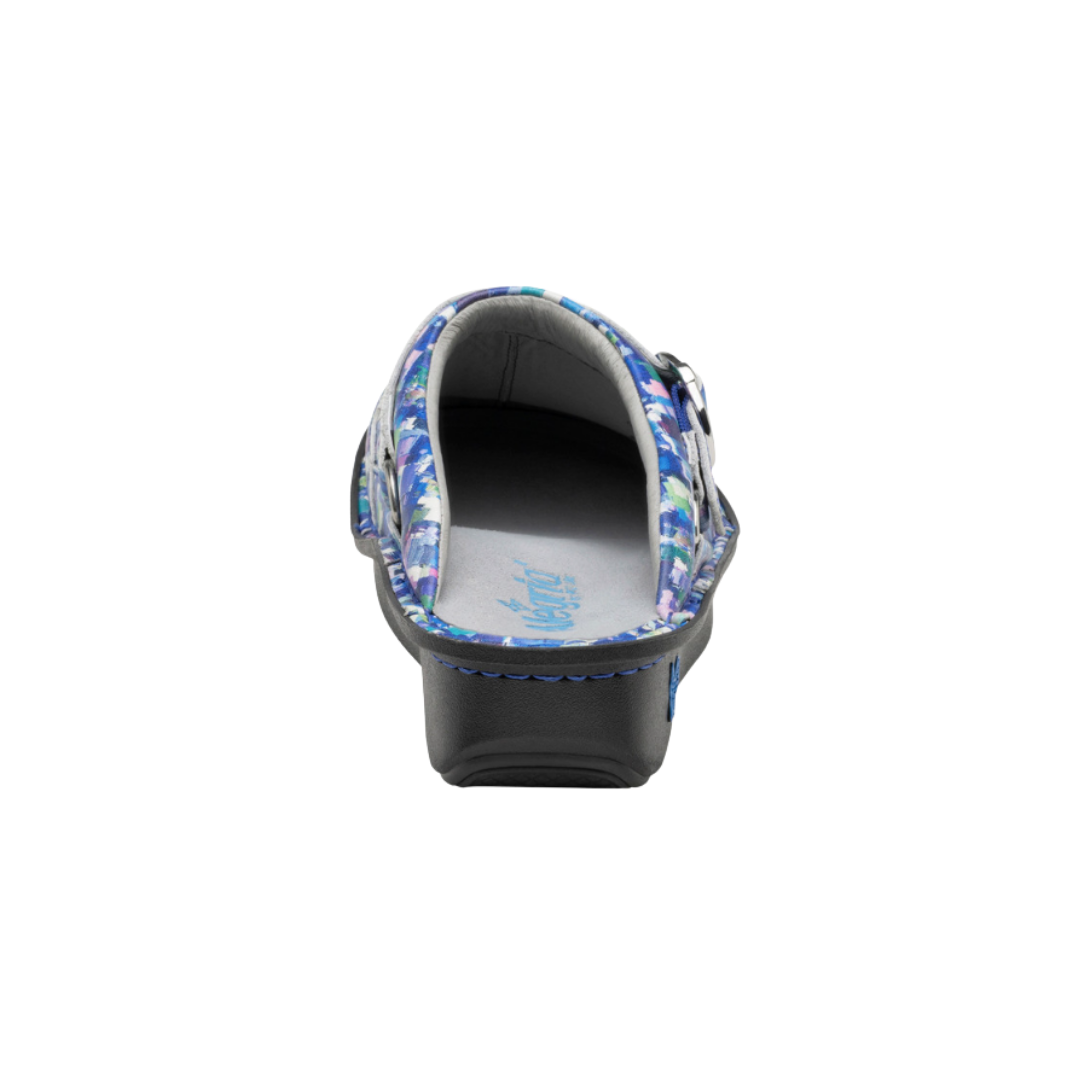 Back View of Women’s Alegria Seville clog in Welcome Back Blotter blue print – featuring a cushioned cork and memory foam footbed, supportive heel counter, and slip-resistant outsole for lasting wear.