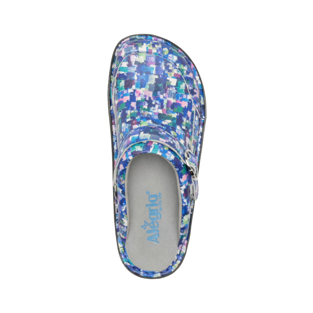 Top View of Women’s Alegria Seville clog in Welcome Back Blotter blue print – featuring a cushioned cork and memory foam footbed, swivel strap with adjustable buckle, and roomy toe box for a comfortable fit.
