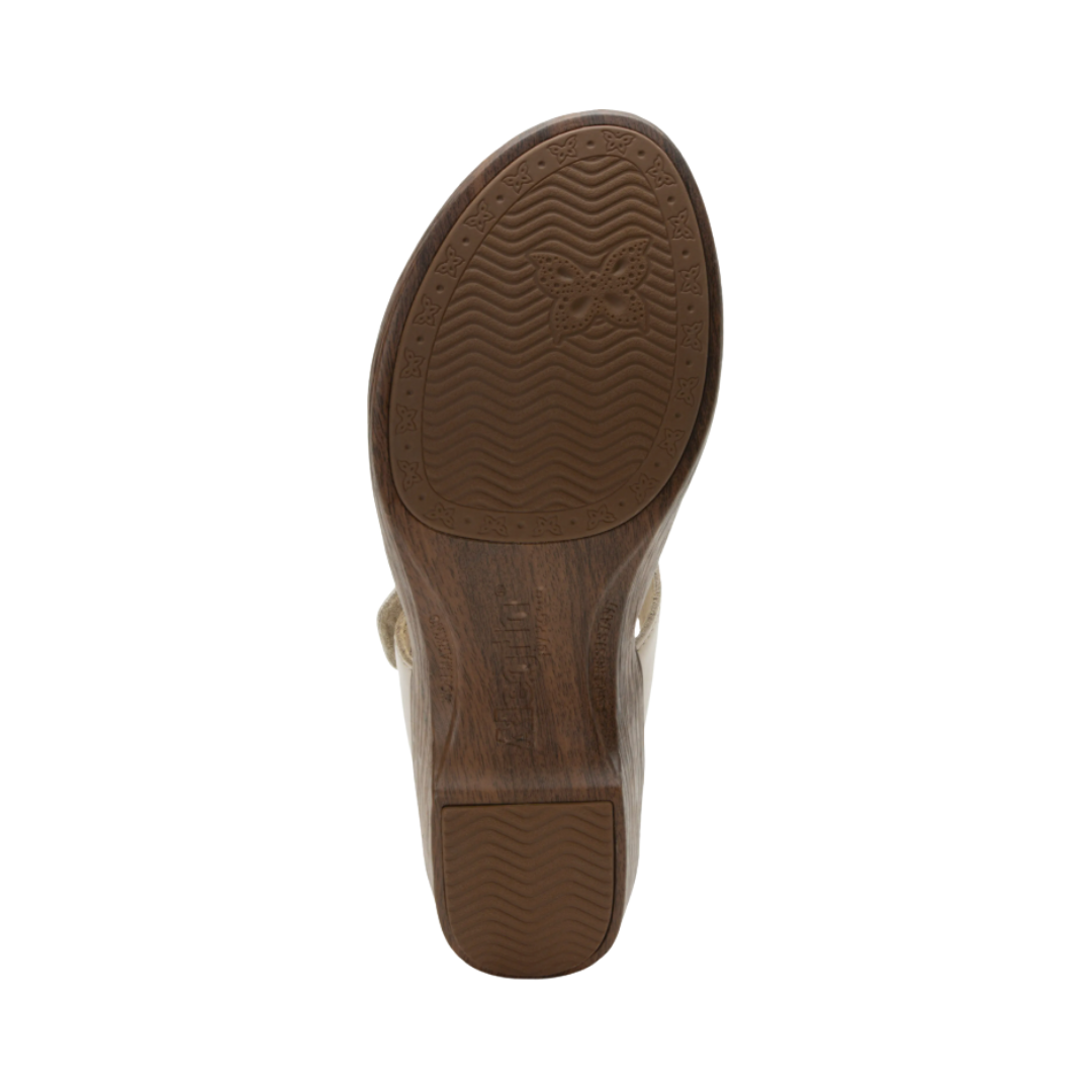 Bottom View of Women’s Alegria Shantal sandal in oat – featuring a slip-resistant patterned outsole, durable tread design, and lightweight construction for secure footing.