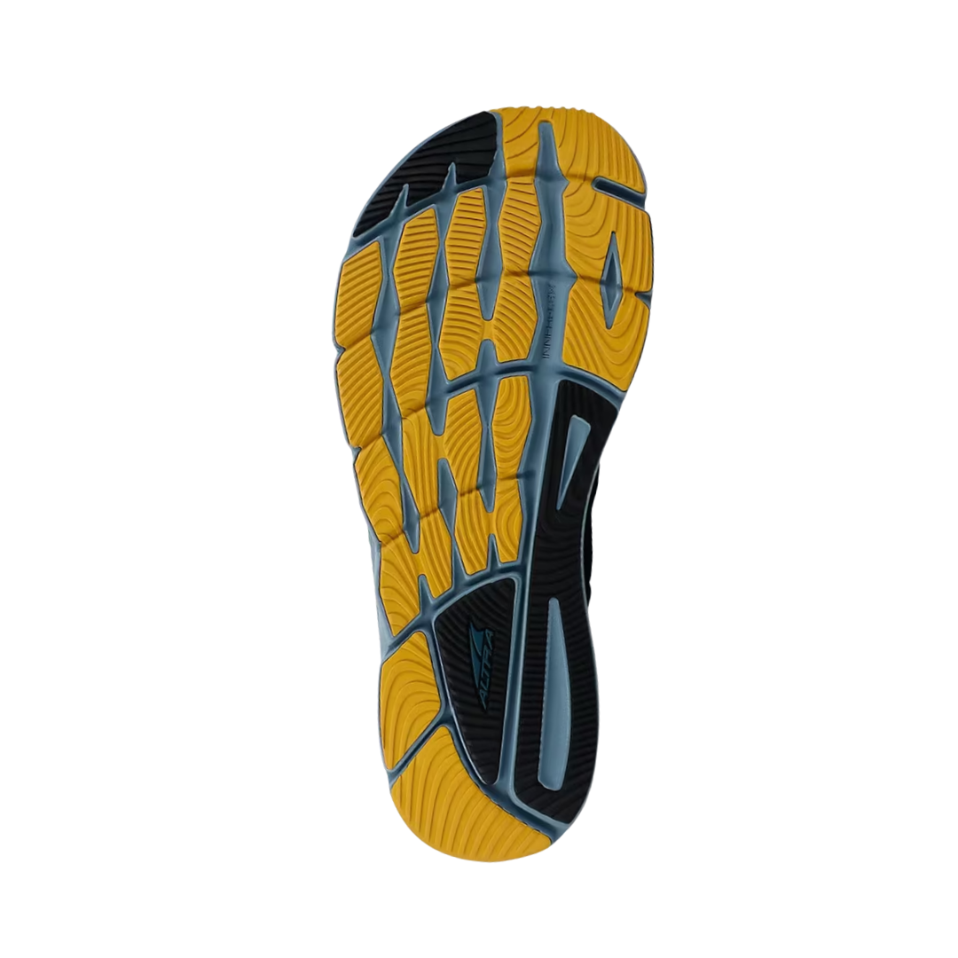 Bottom view of men’s Altra Torin 5 in Majolica Blue – featuring a durable rubber outsole with strategically placed traction pads for a smooth, responsive ride on various surfaces.