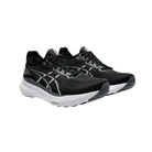 Side view of Men’s ASICS Gel-Kayano 31 running shoe in black and white – showcasing advanced GEL cushioning, engineered mesh upper, and support technology for smooth transitions.