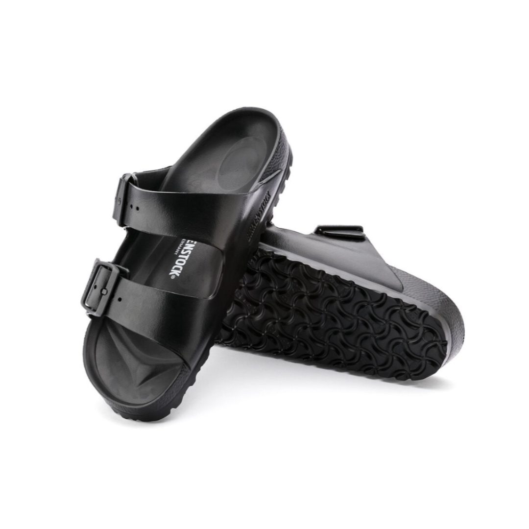Angled view of Men’s Birkenstock Arizona Essential EVA 2-strap sandal in all black – showcasing waterproof EVA material with a contoured footbed for lightweight comfort.