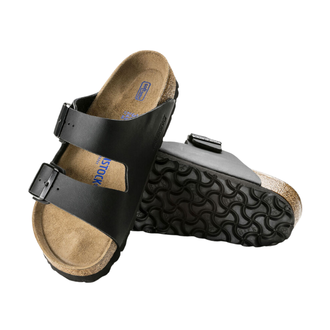 Angled view of Men’s Birkenstock Arizona Soft Footbed sandal in all black – featuring Birko-Flor synthetic straps and cork footbed for comfort and support.