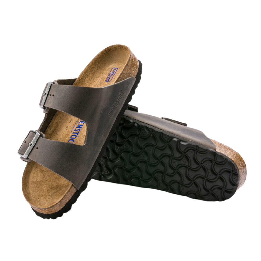 Angled view of Men’s Birkenstock Arizona Soft Footbed sandal in dark grey – showcasing oiled leather straps and classic cork footbed for durability and comfort.
