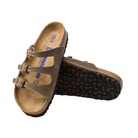 Angled view of Women’s Birkenstock Florida Soft Footbed sandal in tobacco brown — featuring premium oiled leather straps for a rich, durable finish, a soft footbed that cushions and molds to your foot for personalized comfort, and a cork sole engineered to provide excellent arch support and shock absorption for all-day wear.
