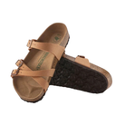 Angled view of Women’s Birkenstock Franca Vegan Birkibuc sandal in burnt orange - featuring eco-friendly Birkibuc straps that offer the look and feel of leather without animal products, three adjustable straps for a fully customized fit, and a cork footbed that cradles the foot to reduce fatigue and increase comfort.