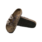 Angled view of Women’s Birkenstock Granada Soft Footbed sandal in dark brown - highlighting a soft footbed that provides extra padding underfoot, adjustable two-strap design for versatile fit adjustments, and a durable cork sole that delivers excellent shock absorption and breathability.