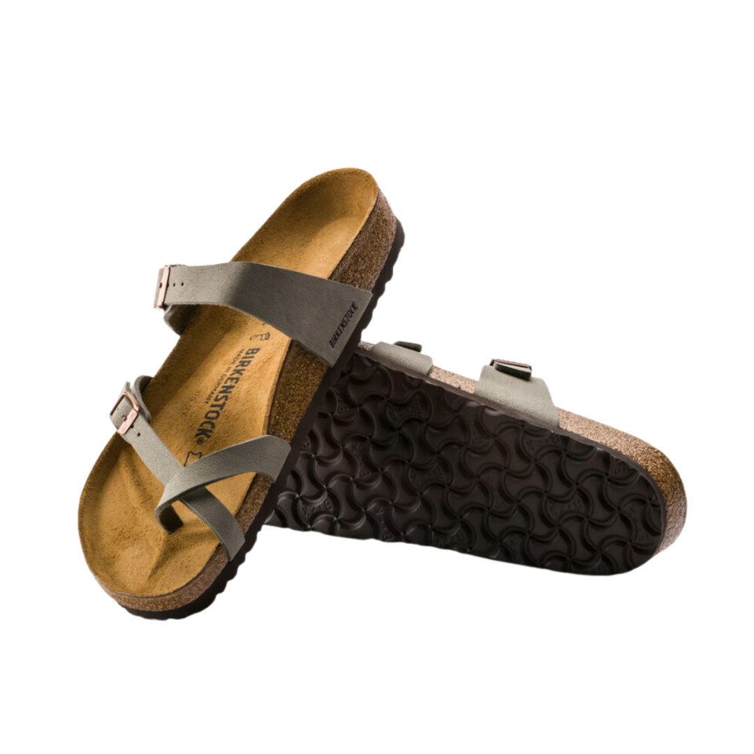 Angled view of Women’s Birkenstock Mayari Birkibuc sandal in dark grey - crafted with durable Birkibuc synthetic straps that resist wear and tear, a toe loop design that stabilizes the foot, and a cork footbed engineered to provide cushioning and natural support with every step.