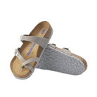 Angled view of Women’s Birkenstock Mayari Soft Footbed nubuck leather sandal in light grey - showcasing premium nubuck leather straps with a soft, cushioned footbed that adapts to your foot’s shape, paired with a natural cork sole that offers both shock absorption and long-lasting durability.