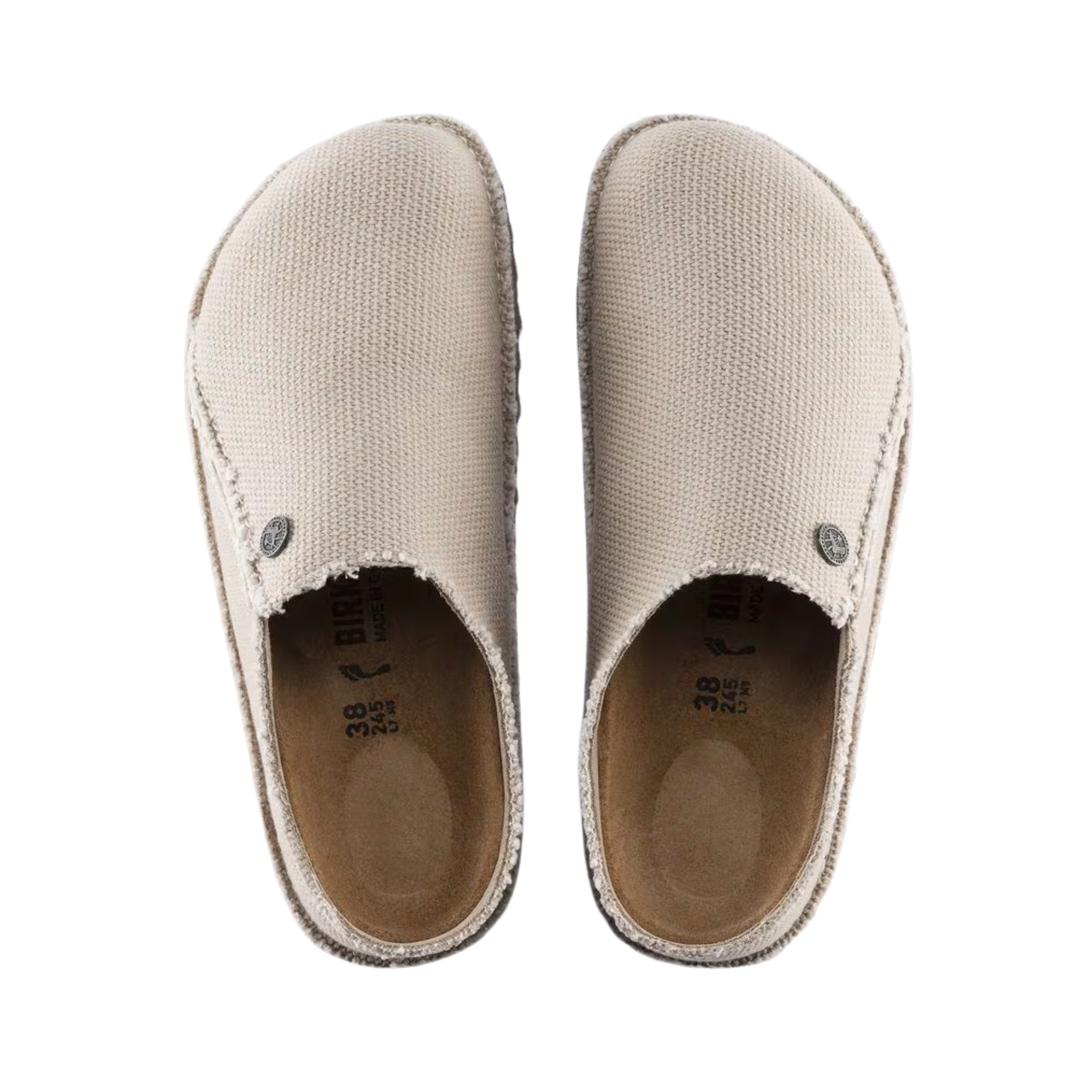 Top View of Women’s Birkenstock Zermatt Canvas Textile slipper in eggshell – featuring a soft canvas textile upper, contoured cork-latex footbed for arch support, and roomy toe box for natural foot positioning.