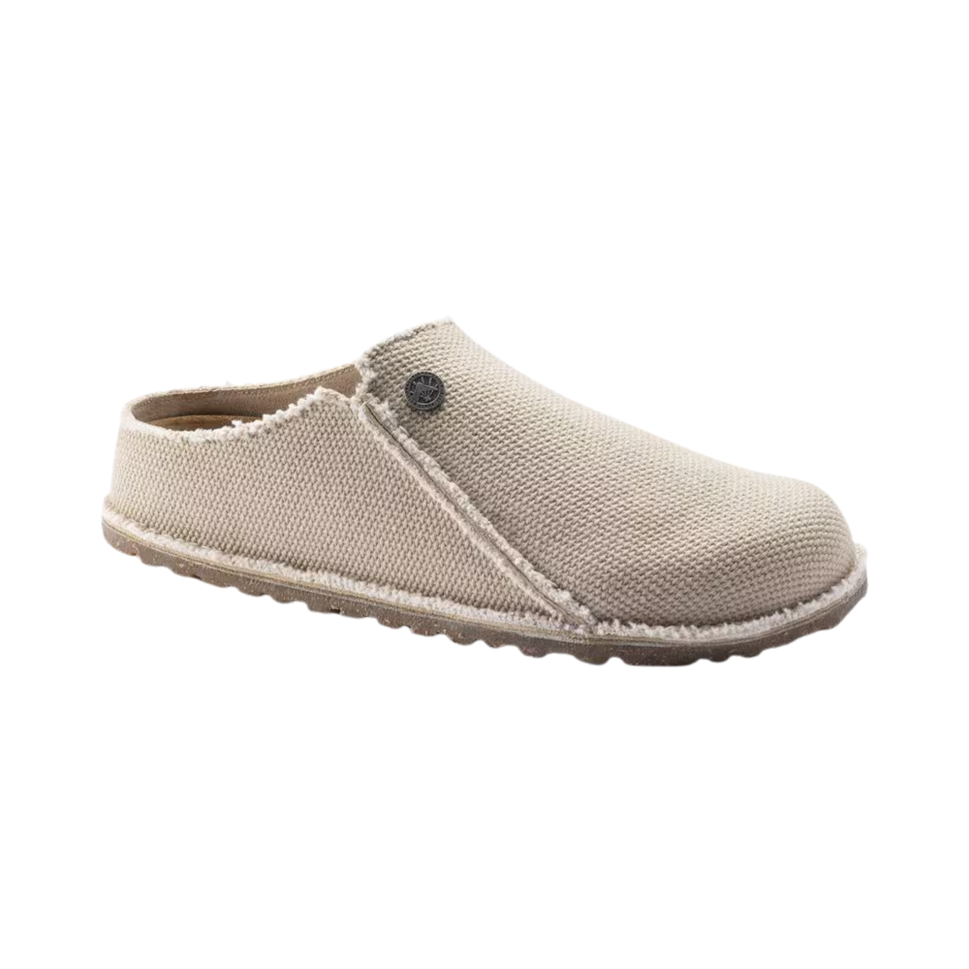Side View of Women’s Birkenstock Zermatt Canvas Textile slipper in eggshell – featuring a minimalist canvas upper, contoured cork-latex footbed for all-day comfort, and flexible rubber outsole for light traction.