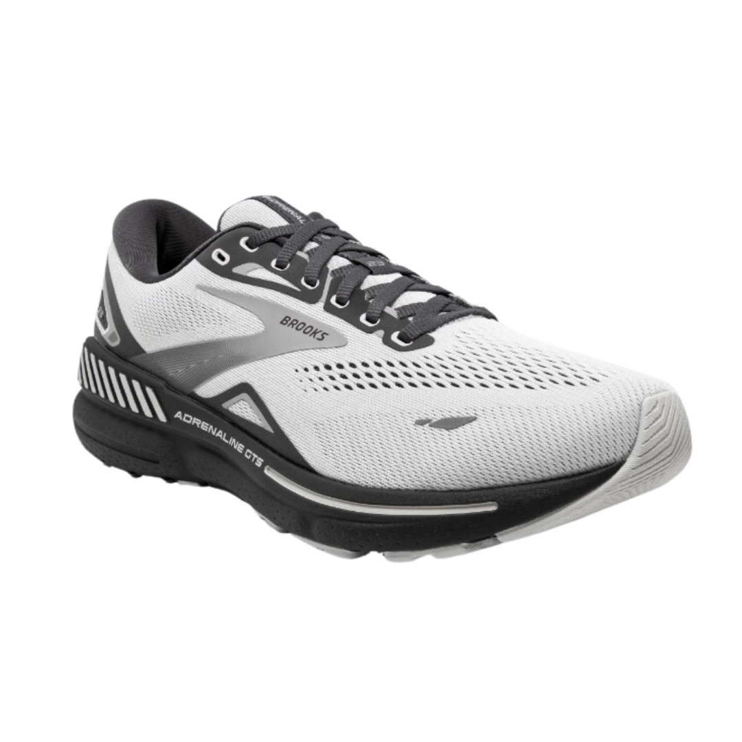 Angled view of Men’s Brooks Adrenaline GTS 23 running shoe in oyster, ebony, and alloy – featuring GuideRails® support system, soft DNA LOFT cushioning, and a breathable mesh upper for a stable, cushioned ride.