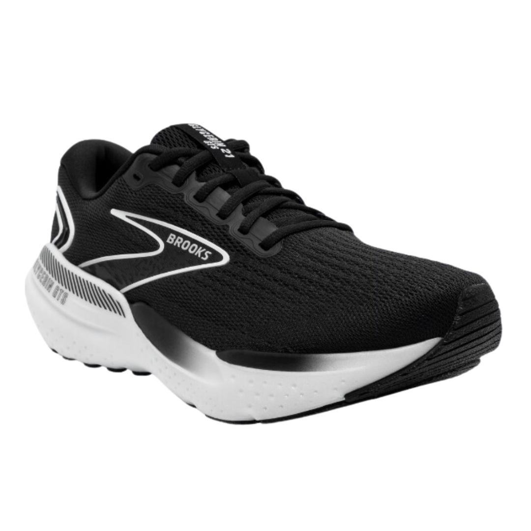 Angled view of Brooks Glycerin GTS 21 athletic shoe in black and white – featuring GuideRails support technology, plush midsole cushioning, and breathable mesh upper for neutral support.