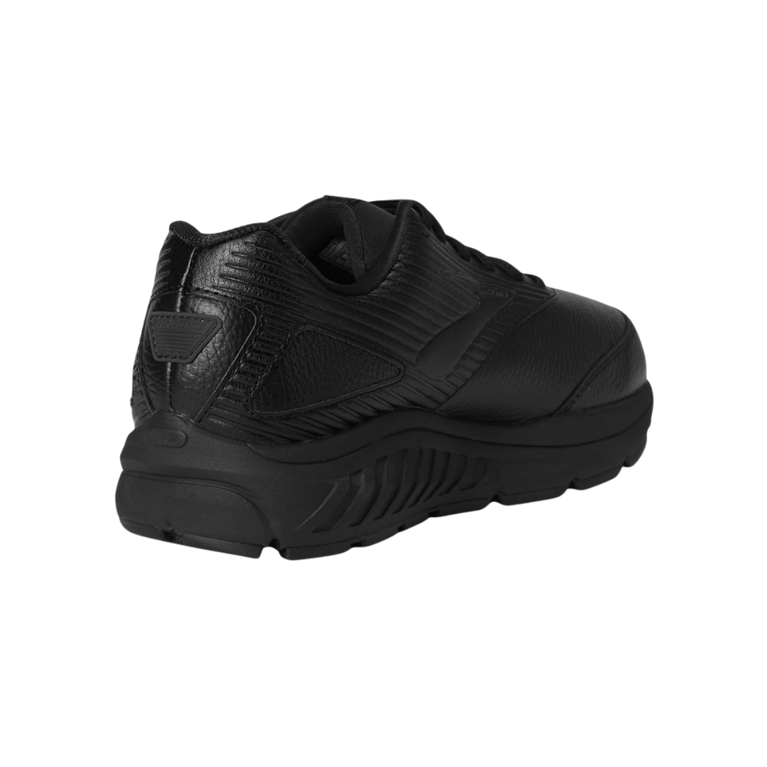 Angled View of Men’s Brooks Addiction Walker 2 walking shoe in black black – featuring a full-grain leather upper with padded collar, lace-up design for secure fit, and roomy toe box with supportive construction for all-day walking comfort.