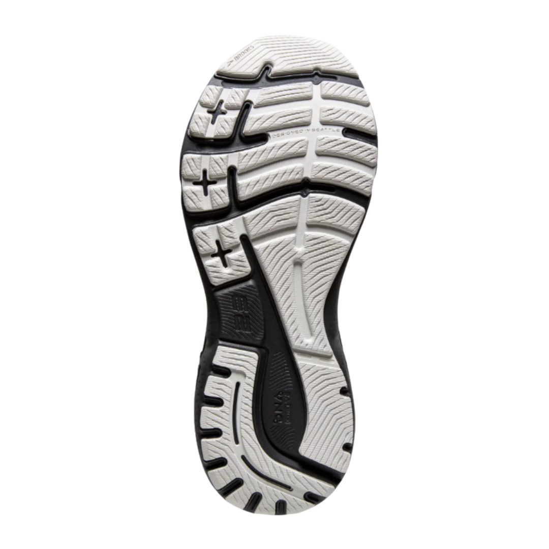 Bottom view of Men’s Brooks Adrenaline GTS 23 running shoe – featuring a durable rubber outsole with segmented crash pad and flexible grooves for smooth transitions and steady traction.
