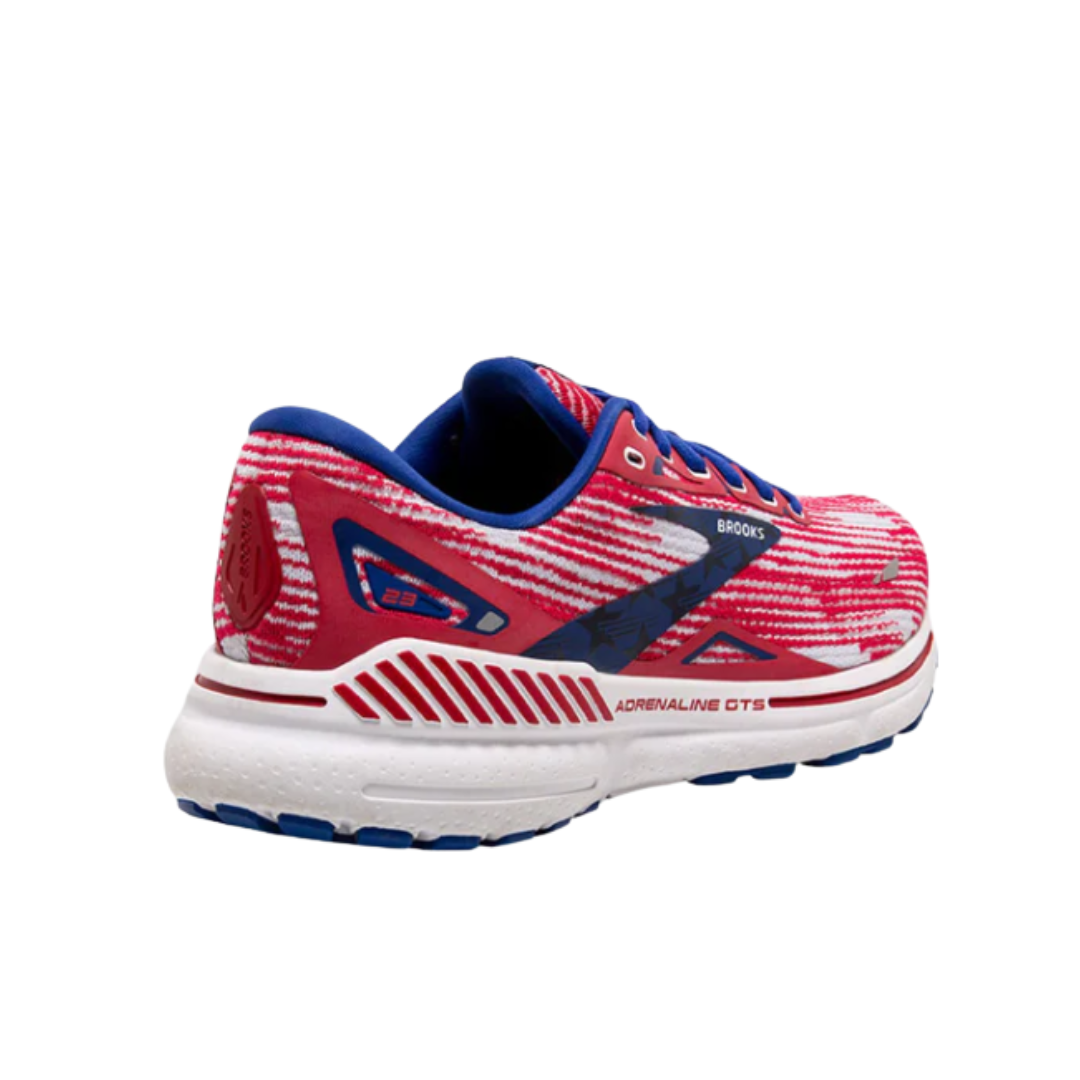 Side view of Women’s Brooks Adrenaline GTS 23 running shoe in surf white and tango – featuring GuideRails® support system, responsive cushioning, and sleek design for stability and comfort.