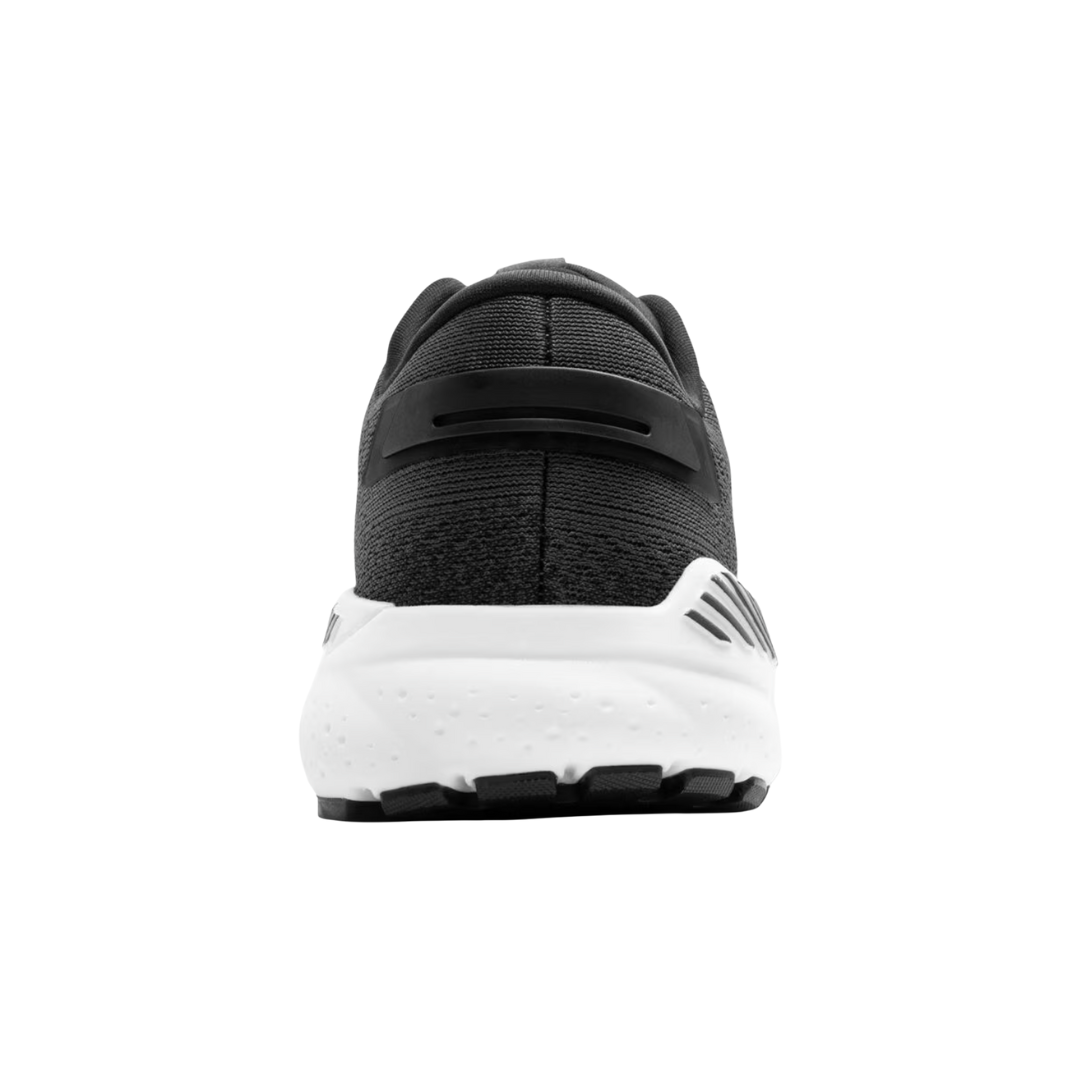 Back view of Women’s Brooks Ariel GTS 24 running shoe in ebony, black, and white – featuring molded heel counter for rearfoot stability, pull tab for easy on and off, and subtle branding details.