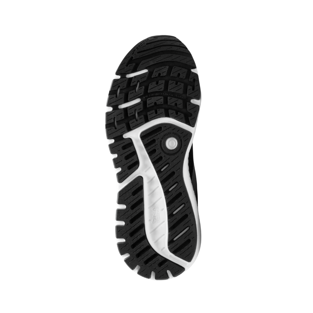 Bottom view of Women’s Brooks Ariel GTS 24 running shoe in ebony, black, and white – featuring durable rubber outsole with segmented crash pad for smooth heel-to-toe transitions, flex grooves for natural foot movement, and multi-surface traction for reliable grip.