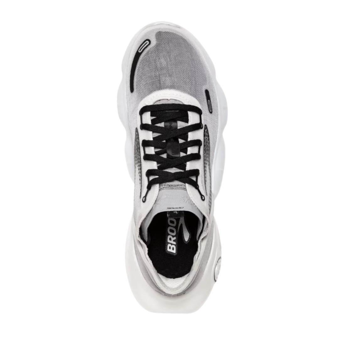 Front View of Women’s Brooks Aurora-BL running shoe in white alloy black – featuring a breathable mono-mesh upper with rounded toe, padded tongue for comfort, and lace-up closure for a secure and adaptive fit.