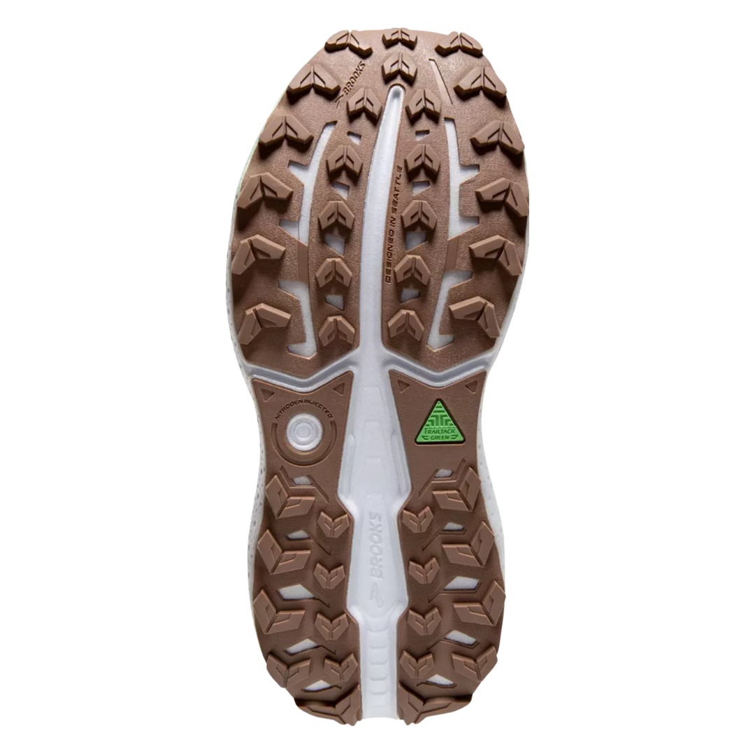 Bottom view of Women’s Brooks Caldera 7 trail running shoe in chateau and white sand – featuring a TrailTack rubber outsole with aggressive lugs for outstanding grip on uneven and wet surfaces.