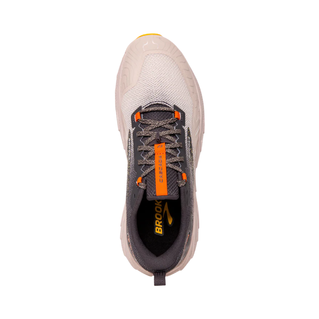 Top view of the men’s Brooks Cascadia 17 trail running shoe in Chateau Grey/Forged Iron, featuring adaptive cushioning, protective trail-ready construction, and grippy TrailTack outsole for stability on rugged terrain; supportive design ideal for hikers and runners.