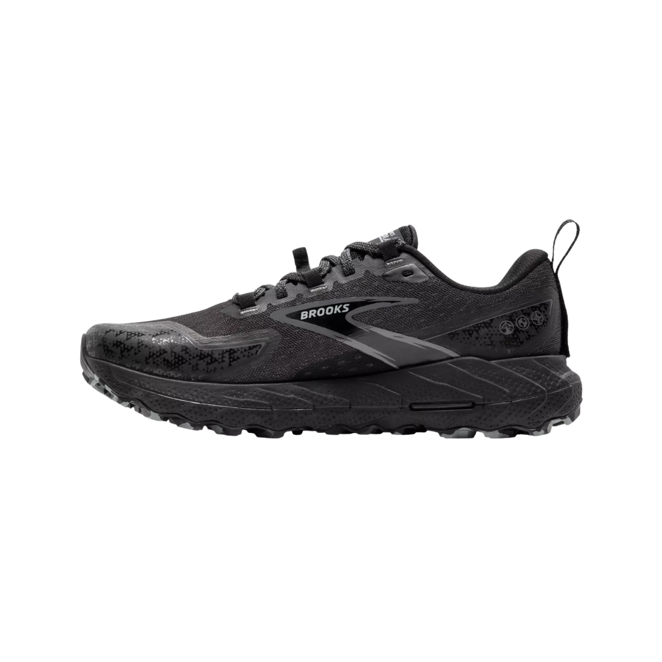 Side view of Men’s Brooks Cascadia 18 in Black/Blackened Pearl/Grey, featuring a trail-ready design with a cushioned midsole for impact absorption, and an aggressive tread pattern on the outsole for superior traction on uneven surfaces.