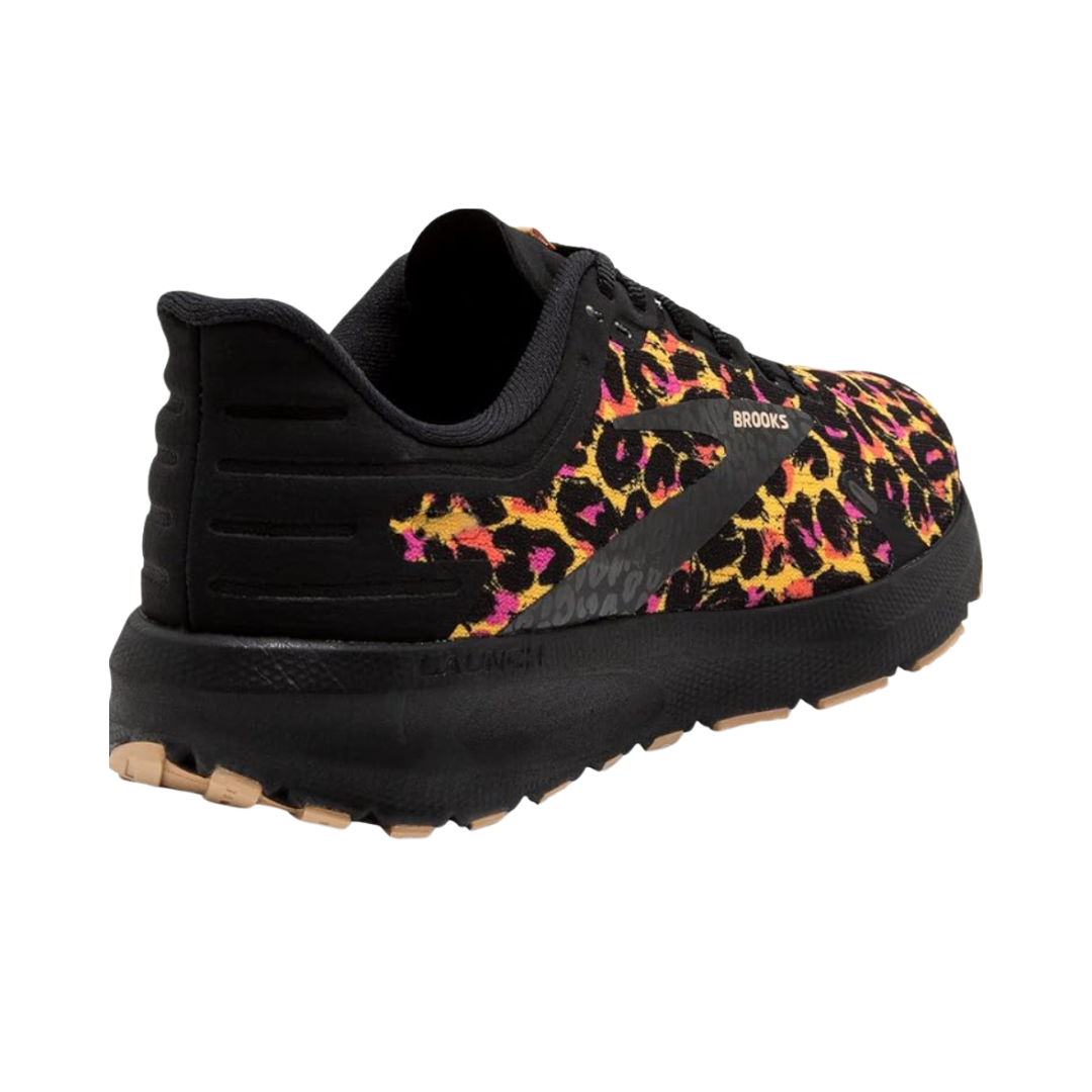 Angled View of Women’s Brooks Launch 9 running shoe in citrus coral black – featuring a lightweight mesh upper for breathability, responsive cushioning for energetic strides, and durable rubber outsole for quick heel-to-toe transitions.