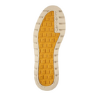 Bottom view of Men’s Carhartt Waterproof 6-Inch Moc Toe Wedge Boot in soft tan – highlighting dual-density rubber outsole with defined tread pattern for reliable grip on various surfaces.