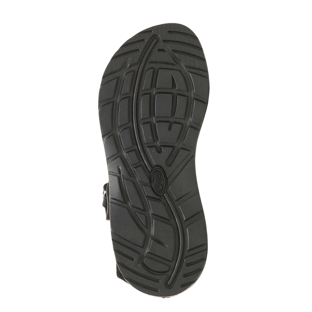 Bottom view of Women’s Chaco Z/Cloud 2 sandal in black and white – featuring non-marking ChacoGrip™ rubber outsole with 3mm lug depth for reliable grip on various terrains.