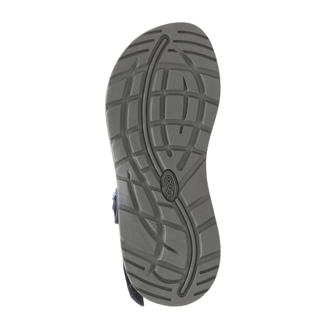 Bottom view of Women’s Chaco Z/Cloud X sandal in Puzzle Azure Blue – featuring non-marking ChacoGrip™ rubber compound with 3mm lug depth for reliable grip on various terrains.