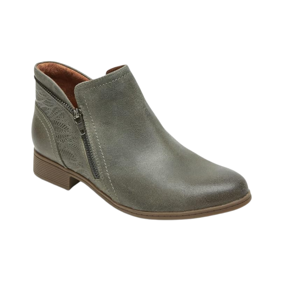 Angled view of Women’s Cobb Hill Crosbie ankle boot in dusty olive – featuring a combination of burnished leather, decorative embossing, and functional side zipper for both style and convenience.