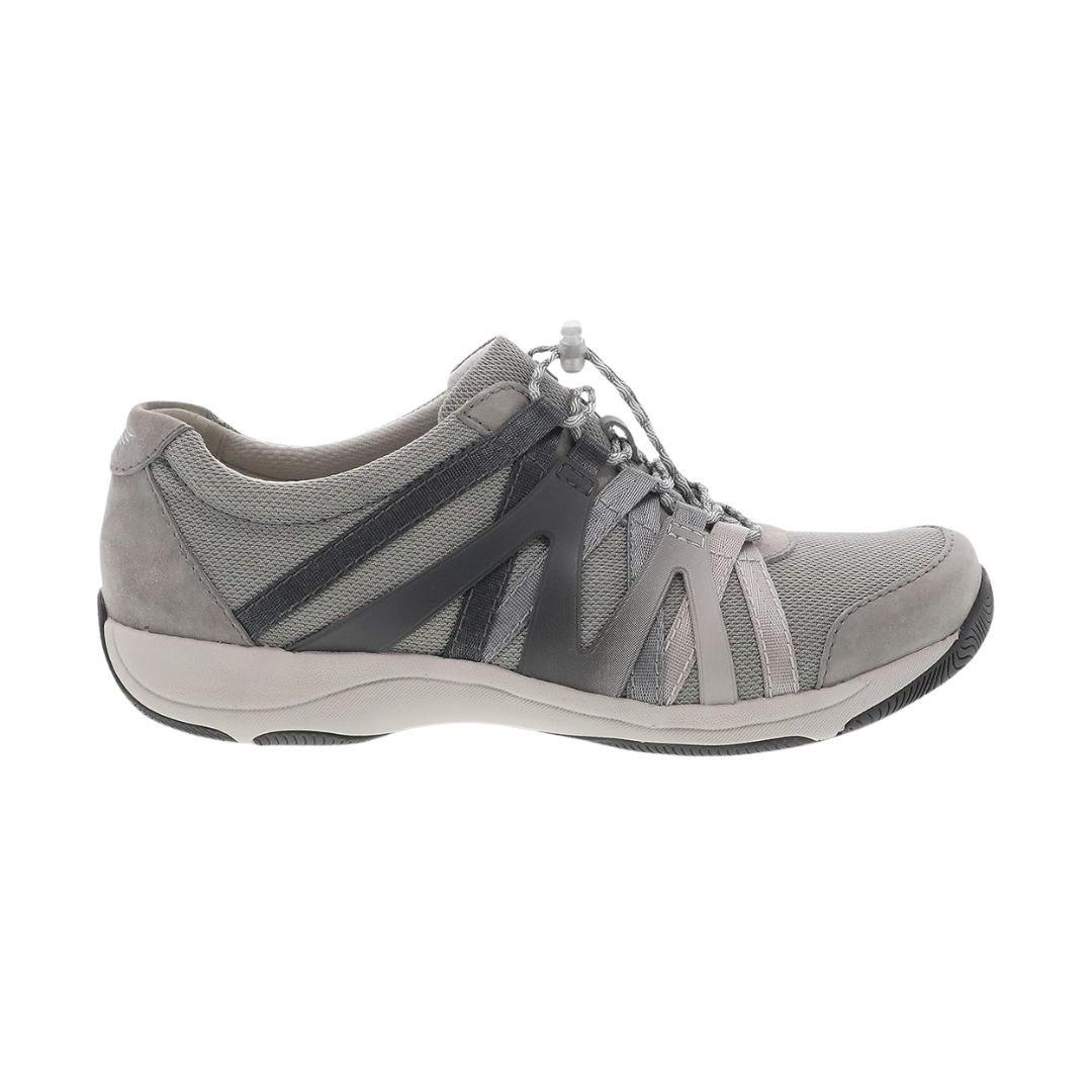 Side view of Women’s Dansko Henriette sneaker in grey suede – featuring a sporty low-cut silhouette, supportive arch midsole, and mix-material upper for flexibility.