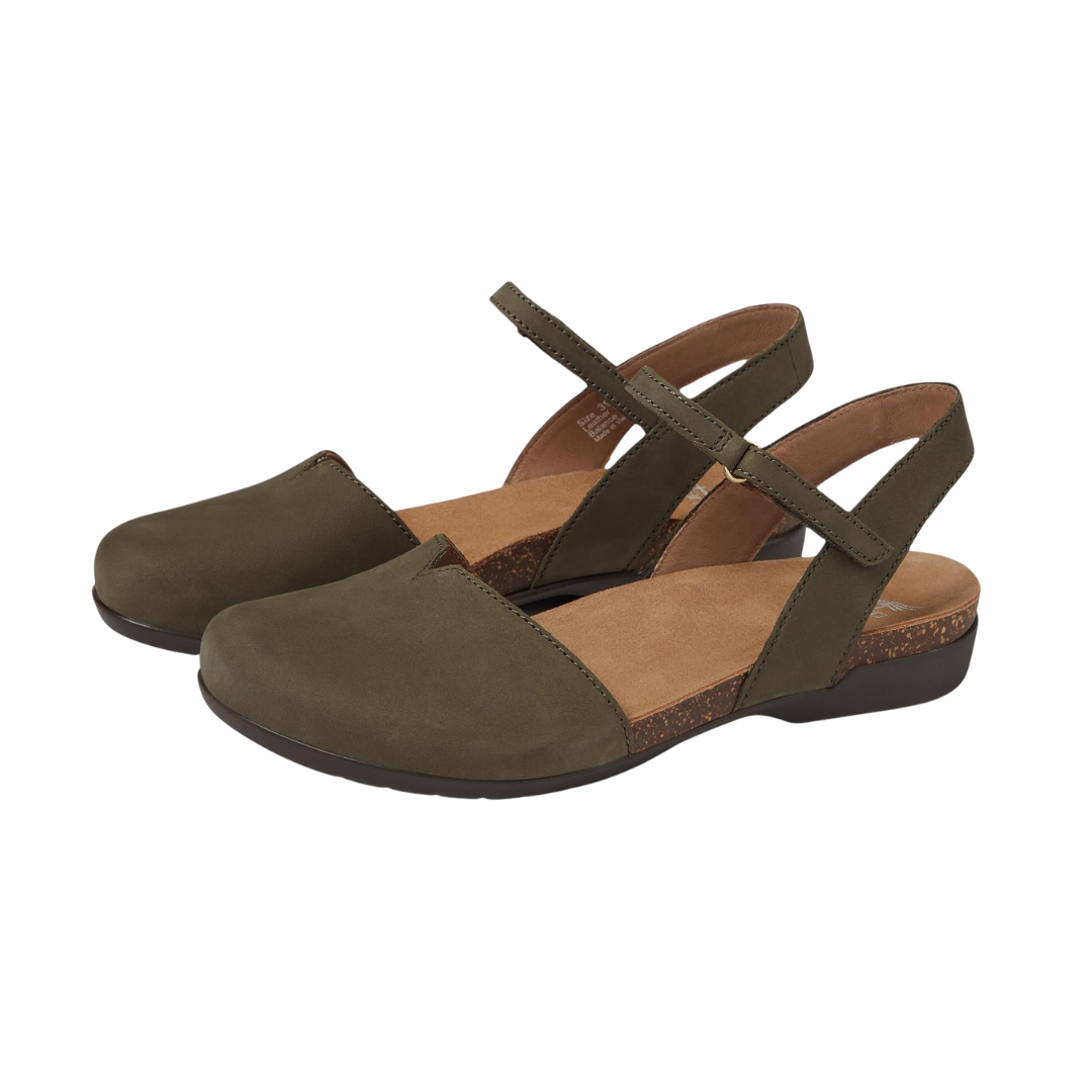 Side view of Women’s Dansko Rowan closed-toe sandal in chocolate milled nubuck – featuring a lightweight rubber outsole, elegant leather cutouts, and low-profile heel.