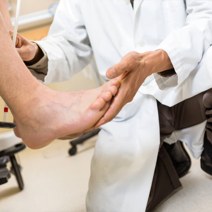 Doctor Assessing Foot