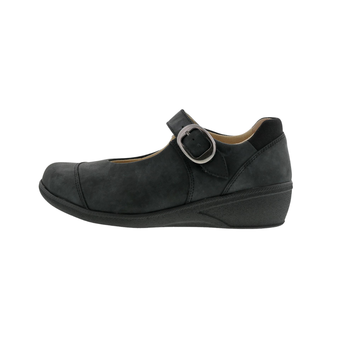 Side view of Women’s Drew Jillian casual shoe in black leather – featuring a low-profile design, stitched leather panels, and buckle closure across the instep.