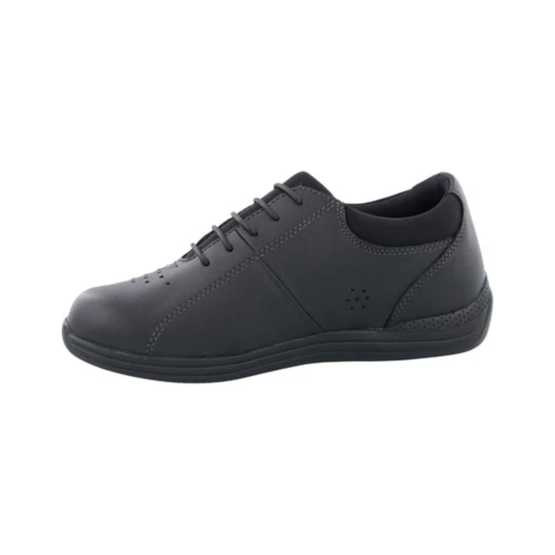 Side view of Women’s Drew Tulip comfort shoe in black leather – featuring a low-cut silhouette, stitched leather panels, and lightweight cushioned sole.