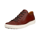 Angled view of Men's Ecco Soft 7 City casual sneaker in cognac brown and white – featuring smooth leather upper, lightweight sole, and casual styling.