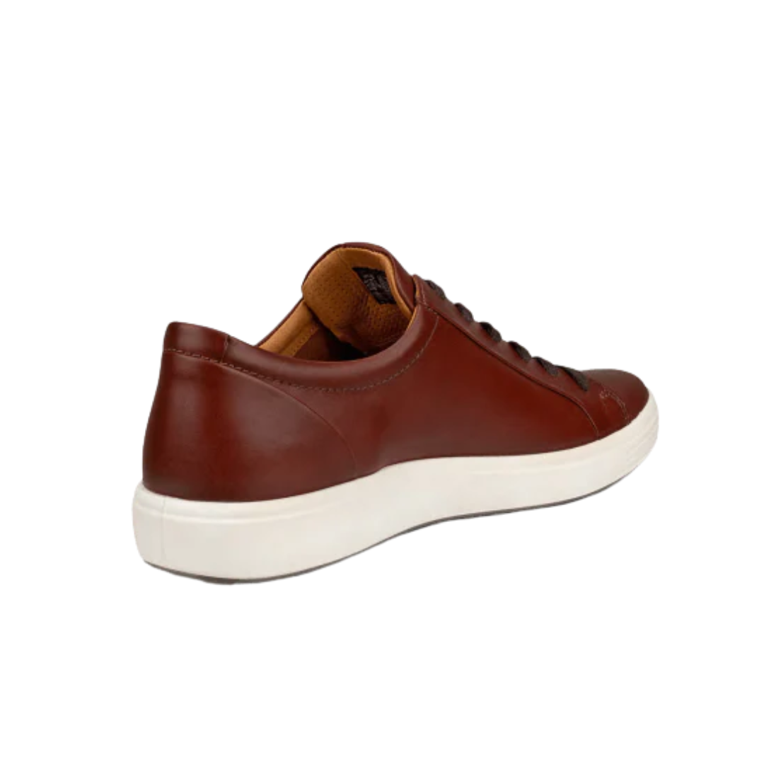 Angled view of Men’s Ecco Soft 7 City sneaker in cognac – featuring ergonomic footbed with anatomical arch support to reduce foot fatigue, lightweight midsole with shock absorption, and stylish silhouette suitable for casual and active wear.