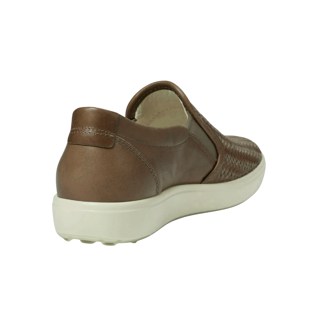 Back view of Women’s Ecco Soft 7 Woven Slip-On in taupe – featuring padded heel collar for enhanced rearfoot cushioning and protection, molded heel counter for improved stability and support during walking, pull tab for easy on and off, and subtle branding details for a polished finish.